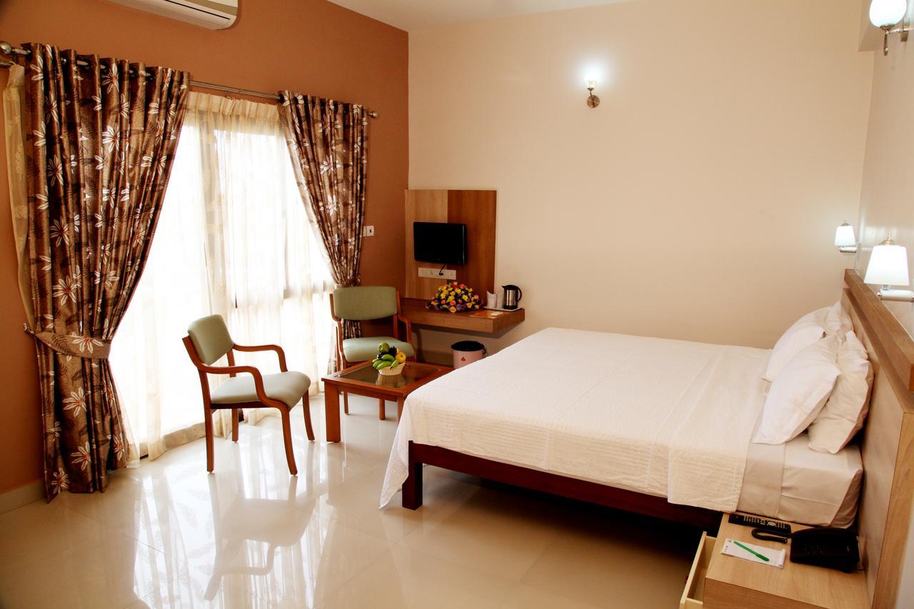 Parassinikkadavu Hotel Polariz חדר תמונה